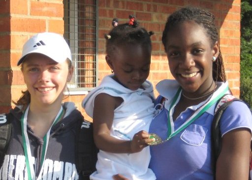 Lauren and  Shani holding 'ballgirl'